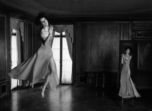 Girl jumping in gown